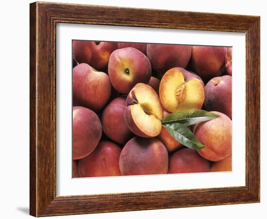 Many Whole Peaches with One Halved-null-Framed Photographic Print