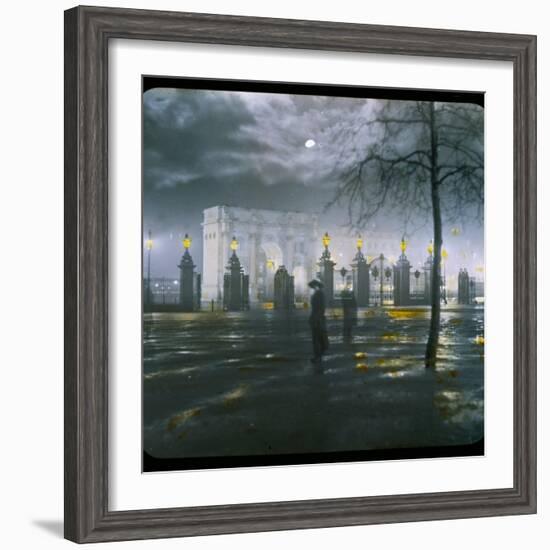 Marble Arch by Night - a Figure Standing in Front of the Park Gates-null-Framed Photographic Print