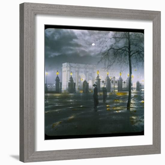 Marble Arch by Night - a Figure Standing in Front of the Park Gates-null-Framed Photographic Print