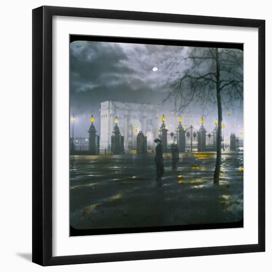 Marble Arch by Night - a Figure Standing in Front of the Park Gates-null-Framed Photographic Print