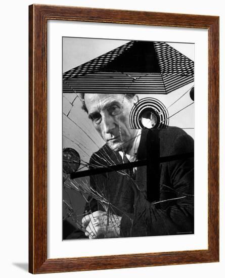 Marcel Duchamp Sitting Behind Example of Dada Art-Allan Grant-Framed Premium Photographic Print