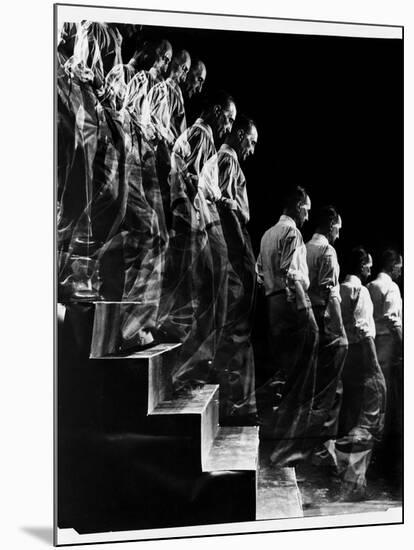 Marcel Duchamp Walking down Stairs in exposure of Famous Painting "Nude Descending a Staircase"-Eliot Elisofon-Mounted Premium Photographic Print