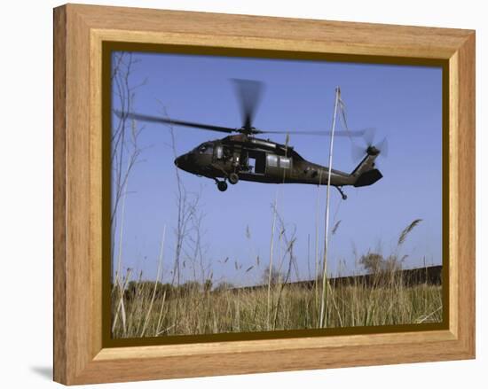 March 31, 2007, a US Army UH-60 Black Hawk Helicopter Prepares to Pick up Soldiers-Stocktrek Images-Framed Premier Image Canvas