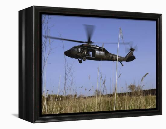 March 31, 2007, a US Army UH-60 Black Hawk Helicopter Prepares to Pick up Soldiers-Stocktrek Images-Framed Premier Image Canvas