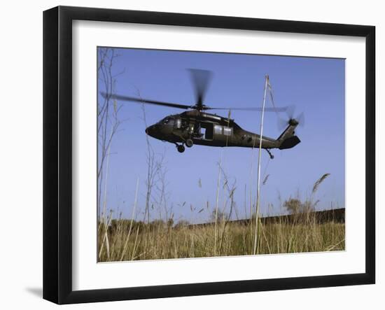 March 31, 2007, a US Army UH-60 Black Hawk Helicopter Prepares to Pick up Soldiers-Stocktrek Images-Framed Photographic Print