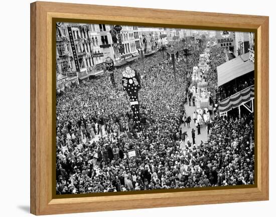 Mardi Gras Revelers Gather at Canal Street-null-Framed Premier Image Canvas