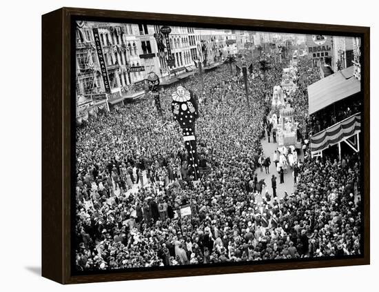 Mardi Gras Revelers Gather at Canal Street-null-Framed Premier Image Canvas