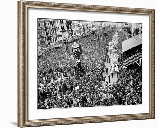 Mardi Gras Revelers Gather at Canal Street--Framed Photographic Print