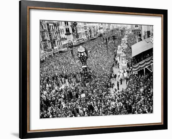 Mardi Gras Revelers Gather at Canal Street-null-Framed Photographic Print