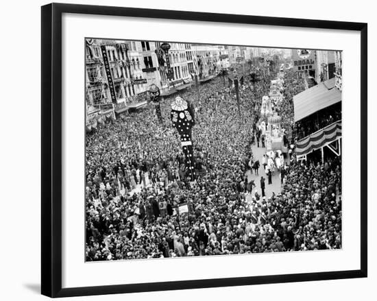 Mardi Gras Revelers Gather at Canal Street-null-Framed Photographic Print