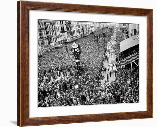 Mardi Gras Revelers Gather at Canal Street-null-Framed Photographic Print