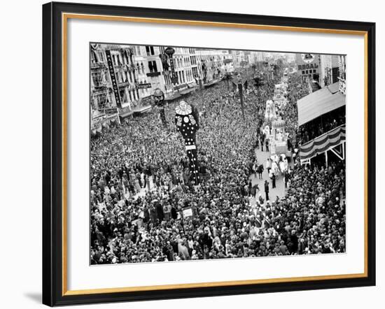 Mardi Gras Revelers Gather at Canal Street-null-Framed Photographic Print