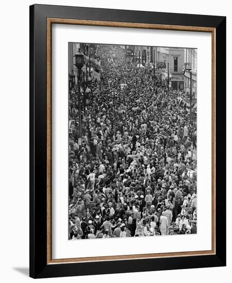 Mardi Gras Revelers Gather at St. Charles Street-null-Framed Photographic Print