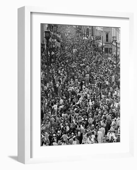 Mardi Gras Revelers Gather at St. Charles Street-null-Framed Photographic Print