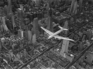 Aerial View of a Dc-4 Passenger Plane in Flight over Manhattan by Margaret Bourke-White