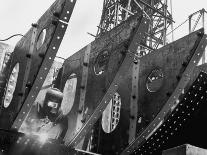 Welder Securing Steel Structure While Working on Hull of a Ship, Bethlehem Shipbuilding Drydock-Margaret Bourke-White-Photographic Print