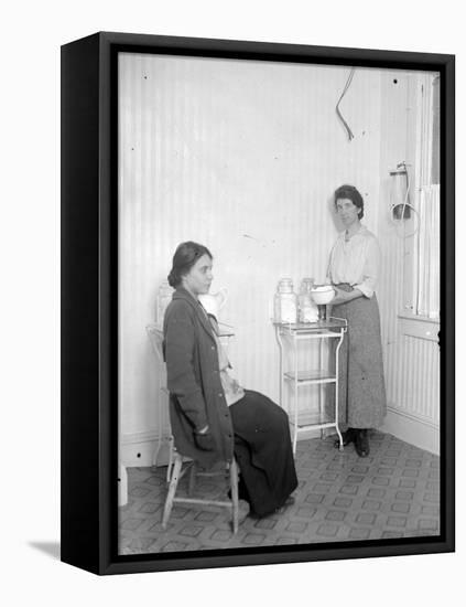 Margaret Sanger with her colleague Fania Mindell, at the clinic inBrownsville, Brooklyn, c.1916-null-Framed Premier Image Canvas