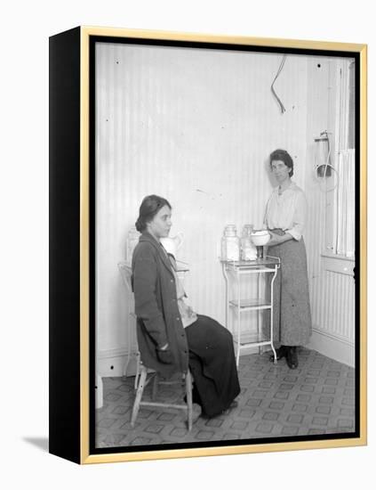 Margaret Sanger with her colleague Fania Mindell, at the clinic inBrownsville, Brooklyn, c.1916-null-Framed Premier Image Canvas