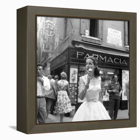 Maria Félix Eating an Ice Cream in Front of a Pharmacy-null-Framed Premier Image Canvas