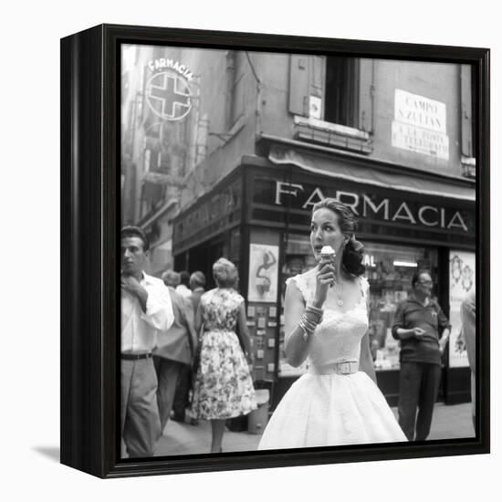 Maria Félix Eating an Ice Cream in Front of a Pharmacy-null-Framed Premier Image Canvas