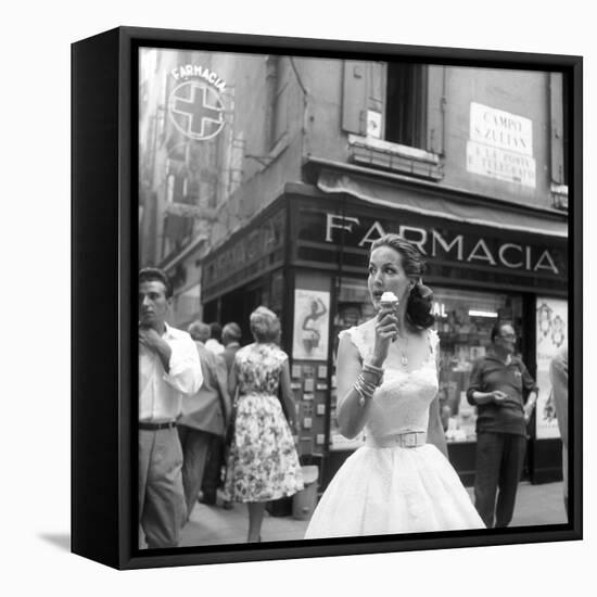 Maria Félix Eating an Ice Cream in Front of a Pharmacy-null-Framed Premier Image Canvas