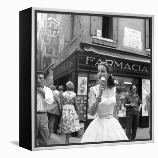 Maria Félix Eating an Ice Cream in Front of a Pharmacy-null-Framed Premier Image Canvas