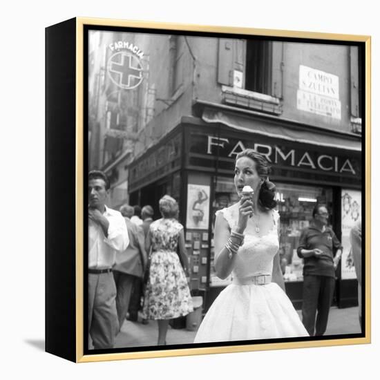 Maria Félix Eating an Ice Cream in Front of a Pharmacy-null-Framed Premier Image Canvas