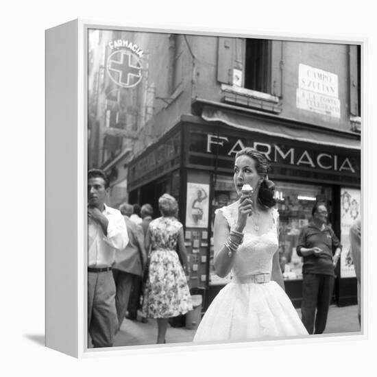 Maria Félix Eating an Ice Cream in Front of a Pharmacy-null-Framed Premier Image Canvas