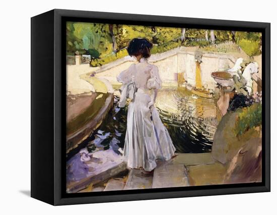 Maria looking at the Fishes, Granja (Maria mirando a los Peces, Granja). 1907-Joaquin Sorolla-Framed Premier Image Canvas