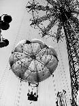 Couple Taking a Ride on the 300 Ft. Parachute Jump at Coney Island Amusement Park-Marie Hansen-Photographic Print