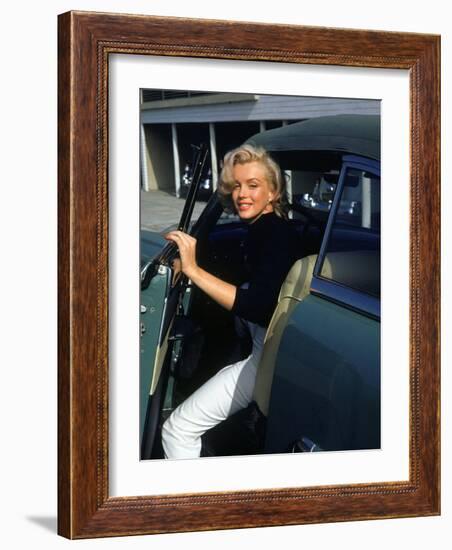 Marilyn Monroe Getting Out of a Car-Alfred Eisenstaedt-Framed Premium Photographic Print