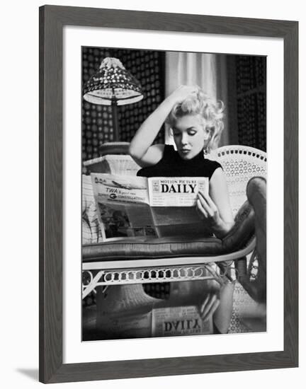 Marilyn Monroe Reading Motion Picture Daily, New York, c.1955-Ed Feingersh-Framed Art Print