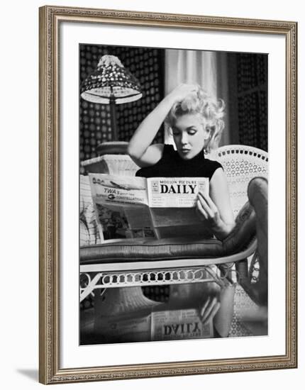 Marilyn Monroe Reading Motion Picture Daily, New York, c.1955-Ed Feingersh-Framed Art Print