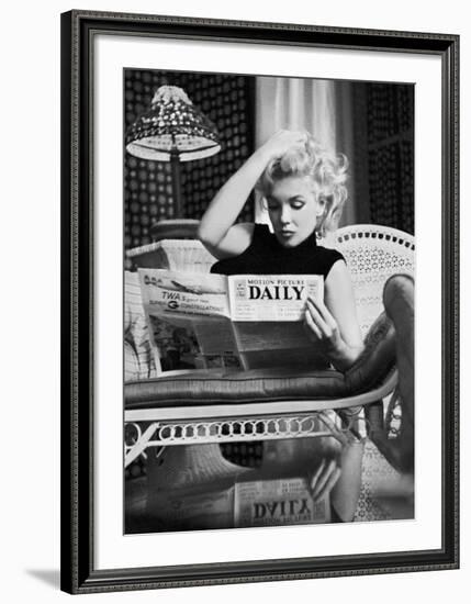 Marilyn Monroe Reading Motion Picture Daily, New York, c.1955-Ed Feingersh-Framed Art Print