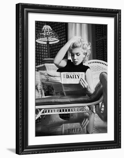 Marilyn Monroe Reading Motion Picture Daily, New York, c.1955-Ed Feingersh-Framed Art Print