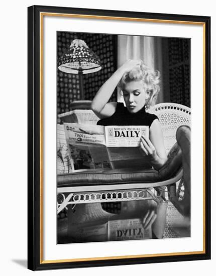 Marilyn Monroe Reading Motion Picture Daily, New York, c.1955-Ed Feingersh-Framed Art Print