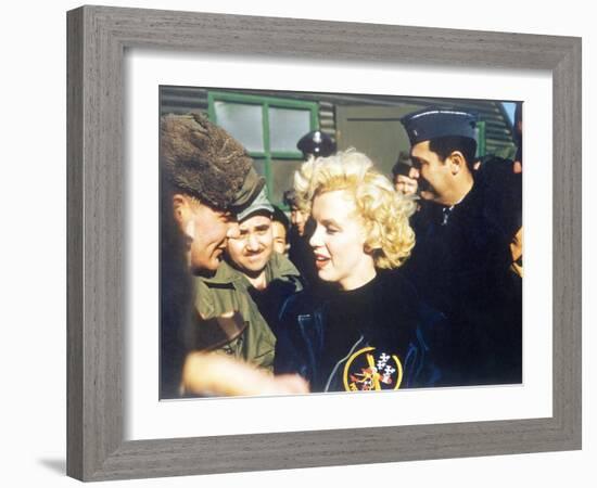 Marilyn Monroe Wearing a Jacket with the 'Mosquito' Patch of the 6147th Tactical Control Group-null-Framed Photo