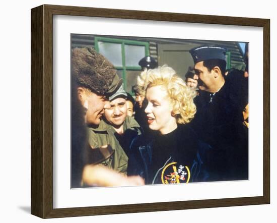 Marilyn Monroe Wearing a Jacket with the 'Mosquito' Patch of the 6147th Tactical Control Group-null-Framed Photo