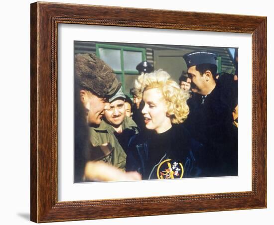 Marilyn Monroe Wearing a Jacket with the 'Mosquito' Patch of the 6147th Tactical Control Group-null-Framed Photo