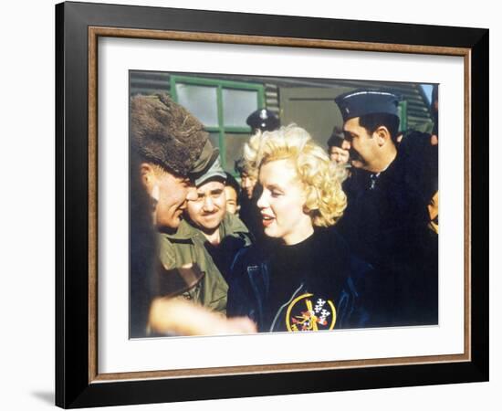 Marilyn Monroe Wearing a Jacket with the 'Mosquito' Patch of the 6147th Tactical Control Group-null-Framed Photo