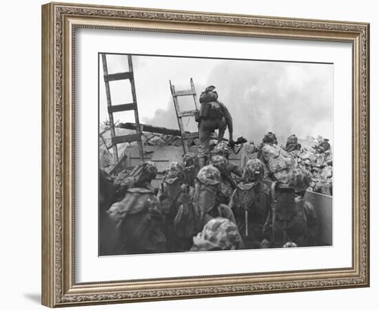 Marine Lt. Baldomero Lopez Scaling a Seawall after Landing on Red Beach in the Invasion of Inchon-null-Framed Photo