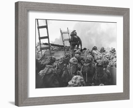 Marine Lt. Baldomero Lopez Scaling a Seawall after Landing on Red Beach in the Invasion of Inchon-null-Framed Photo