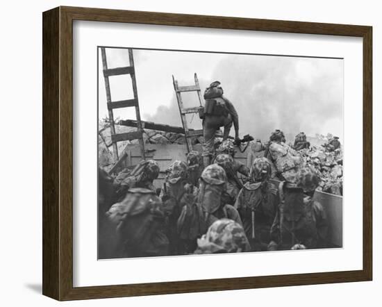 Marine Lt. Baldomero Lopez Scaling a Seawall after Landing on Red Beach in the Invasion of Inchon-null-Framed Photo