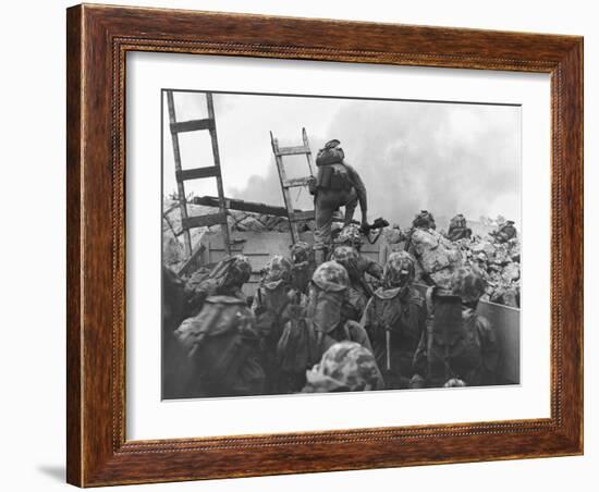 Marine Lt. Baldomero Lopez Scaling a Seawall after Landing on Red Beach in the Invasion of Inchon-null-Framed Photo