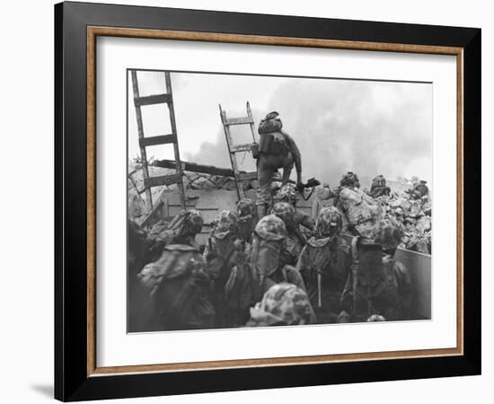 Marine Lt. Baldomero Lopez Scaling a Seawall after Landing on Red Beach in the Invasion of Inchon-null-Framed Photo