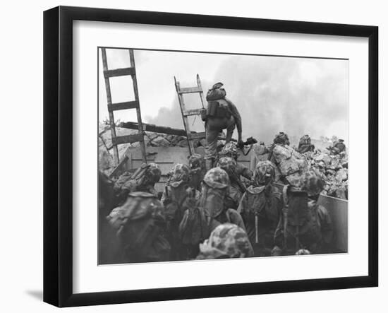 Marine Lt. Baldomero Lopez Scaling a Seawall after Landing on Red Beach in the Invasion of Inchon-null-Framed Photo