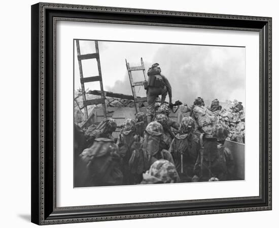 Marine Lt. Baldomero Lopez Scaling a Seawall after Landing on Red Beach in the Invasion of Inchon-null-Framed Photo