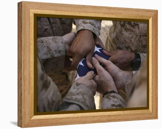 Marines Fold an American Flag after It was Raised in Memory of a Fallen Soldier-Stocktrek Images-Framed Premier Image Canvas