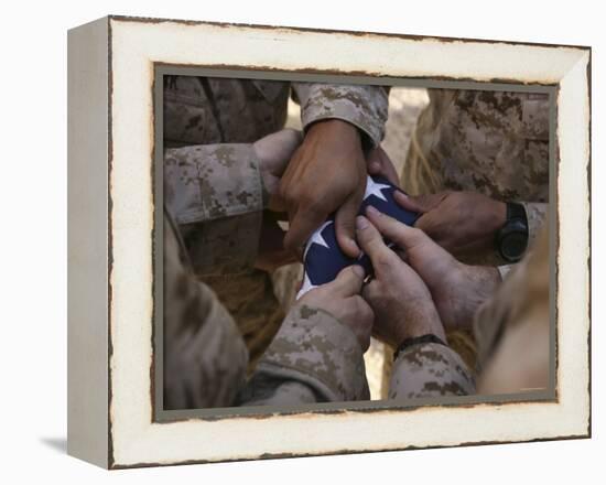 Marines Fold an American Flag after It was Raised in Memory of a Fallen Soldier-Stocktrek Images-Framed Premier Image Canvas