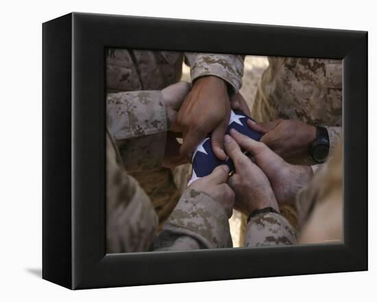 Marines Fold an American Flag after It was Raised in Memory of a Fallen Soldier-Stocktrek Images-Framed Premier Image Canvas